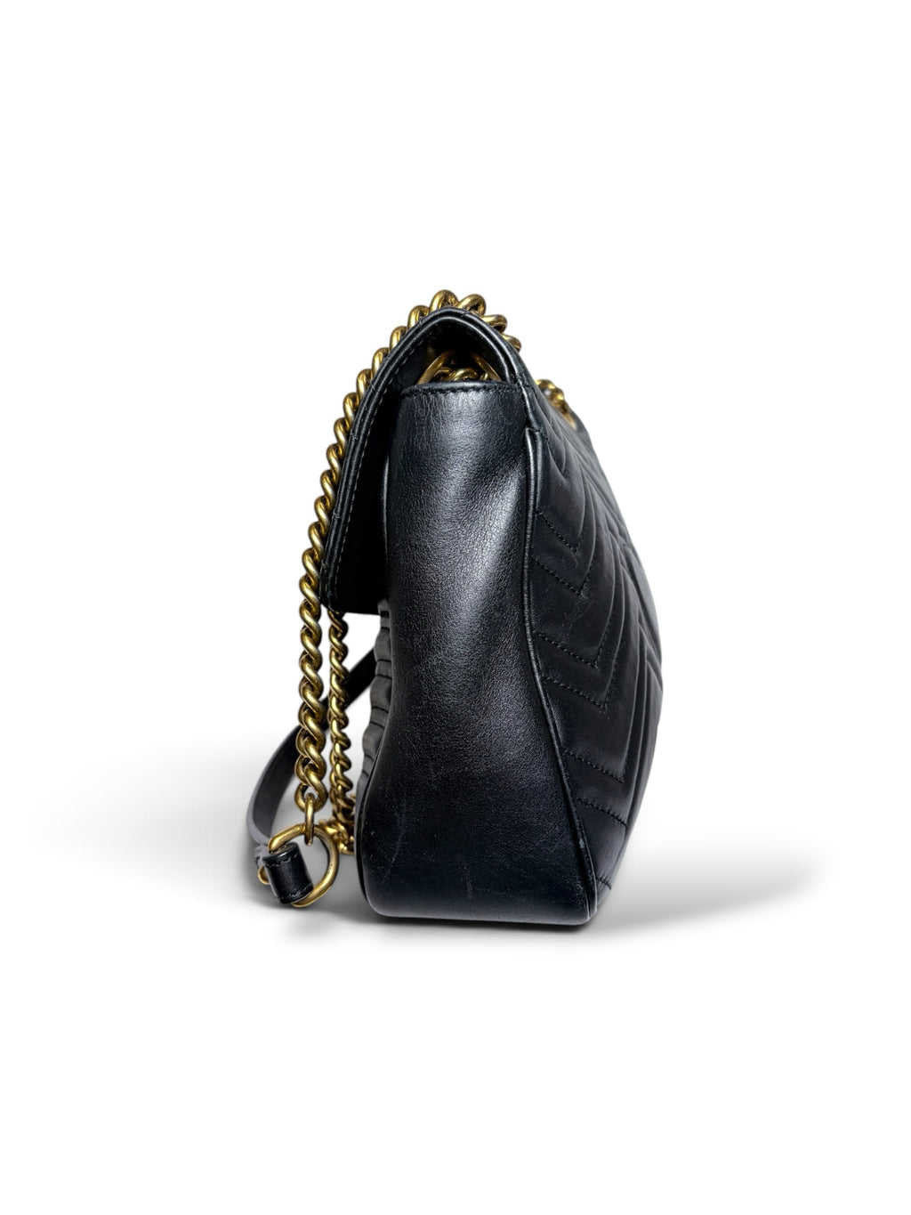 Thrift Mint black leather Gucci Marmont shoulder bag with chevron quilting and antique gold chain strap side view
