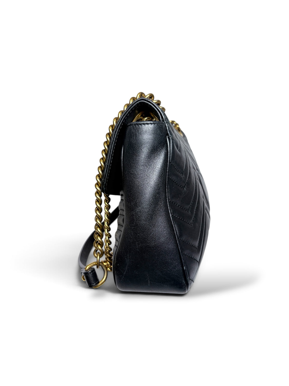 Thrift Mint black leather Gucci Marmont shoulder bag with chevron quilting and antique gold chain strap side view