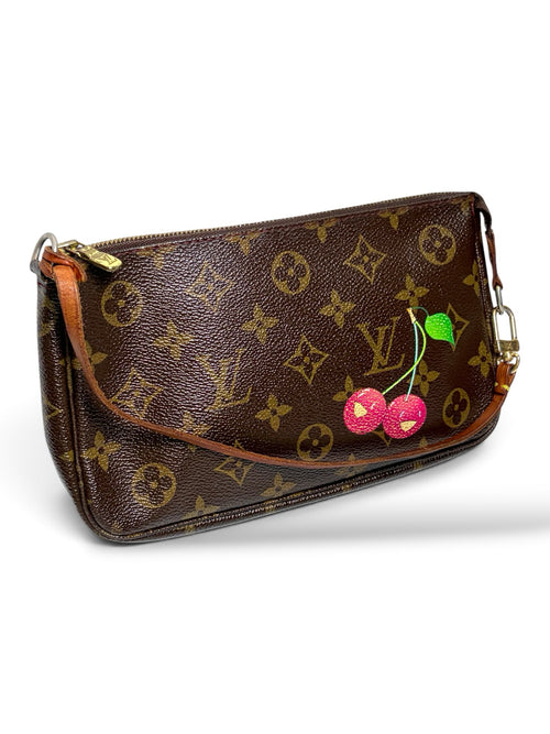 Thrift Mint Louis Vuitton Monogram Pochette Accessoires handbag featuring a playful cherry motif and gold hardware.