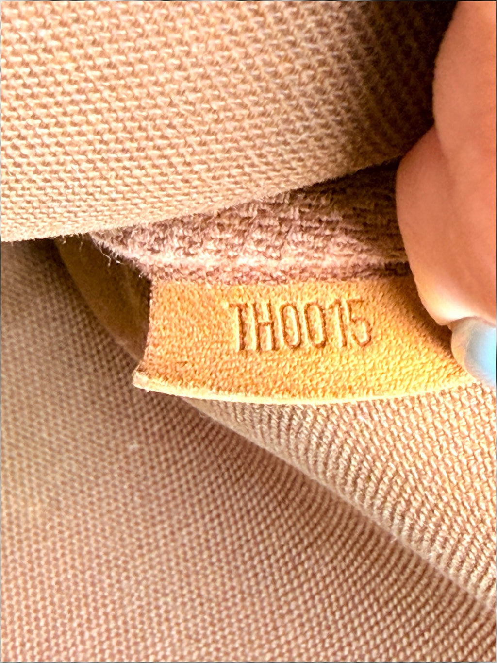 Thrift Mint Louis Vuitton Pochette Accessoires date code TH0015 stamped on interior leather tab