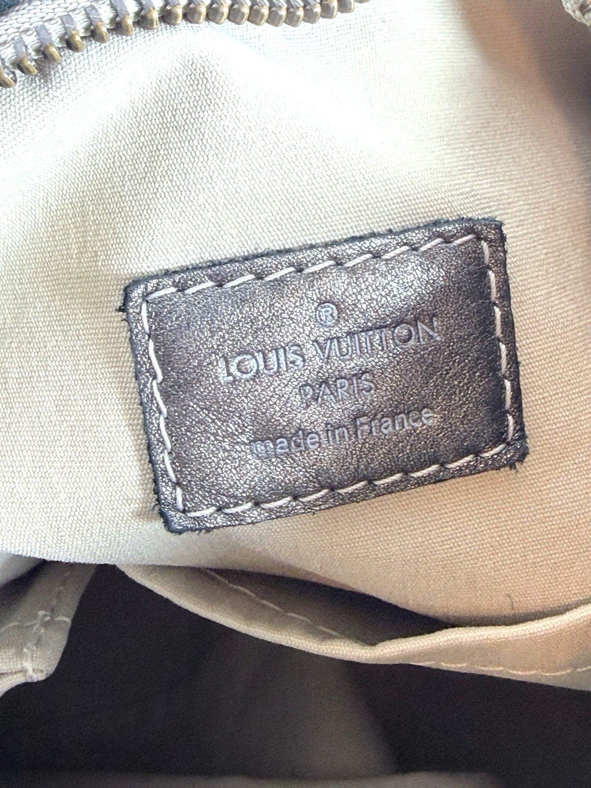 Thrift Mint Louis Vuitton grey metallic leather interior brand label tag inside a monogram canvas shoulder bag